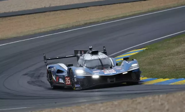 Alpine Endurance Team car (starting no. 35) an Alpine A424 with Paul‑Loup Chatin of France, Ferdinand Habsburg of Austria and Charles Milesi of France races during the 24-hour Le Mans endurance auto race, Saturday June 14, 2025 in Le Mans, western France. (AP Photo/Jeremias Gonzalez)