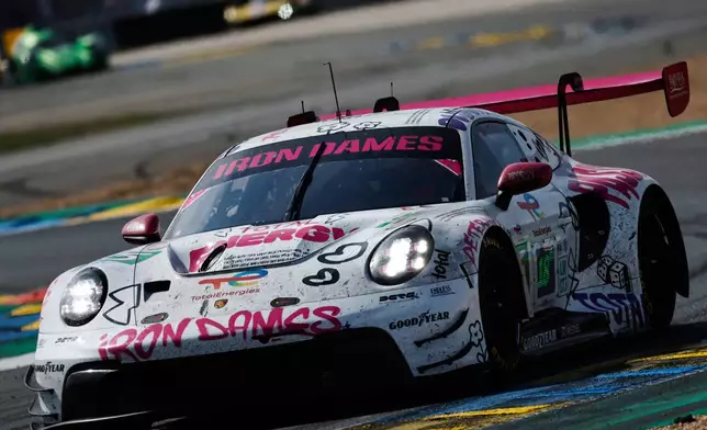 Iron Dames car (starting no. 85) a Porsche 911 GT3 R LMGT3 with Celia Martin of France, Rahel Frey os Switzerland and Sarah Bovy of Belgium races during the 24-hour Le Mans endurance race, Sunday June 15, 2025 in Le Mans, western France. (AP Photo/Jeremias Gonzalez)
