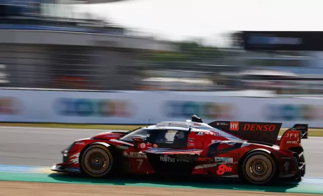 Toyota Gazoo Racing car (starting no. 7) a Toyota GR010 Hybrid with Mike Conway of Great Britain, Kamui Kobayashi of Japan and Nyck de Vries of the Netherlands races during the 24-hour Le Mans endurance race, Sunday June 15, 2025 in Le Mans, western France. (AP Photo/Jeremias Gonzalez)