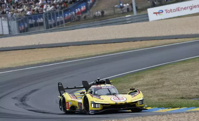 AF Corse car (starting no. 83) a Ferrari 499P with Robert Kubica of Poland, Yifei Ye of China and Phil Hanson of Great Britain races during the 24-hour Le Mans endurance auto race, Saturday June 14, 2025 in Le Mans, western France. (AP Photo/Jeremias Gonzalez)