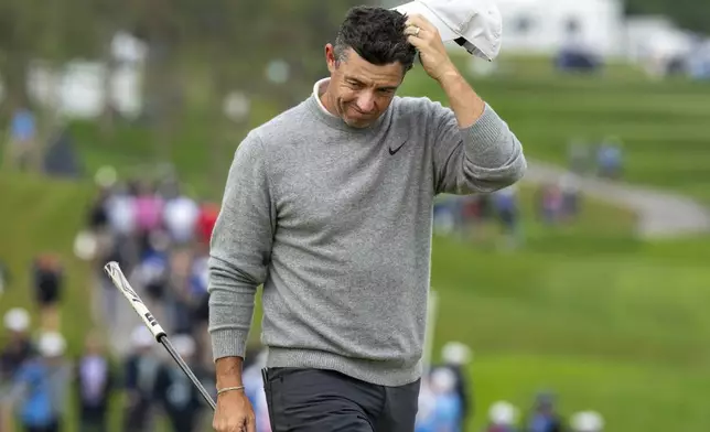 Rory McIlroy, of Northern Ireland ,reacts after missing a putt on the ninth green during the first round of the Canadian Open golf tournament in Caledon, Ontario, Thursday, June 5, 2025. (Frank Gunn/The Canadian Press via AP)