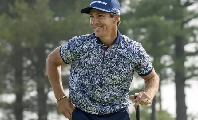 Denmark's Thorbjorn Olesen smiles after putting out on his final hole during the first round of the Canadian Open golf tournament in Caledon, Ontario, Thursday, June 5, 2025. (Frank Gunn/The Canadian Press via AP)