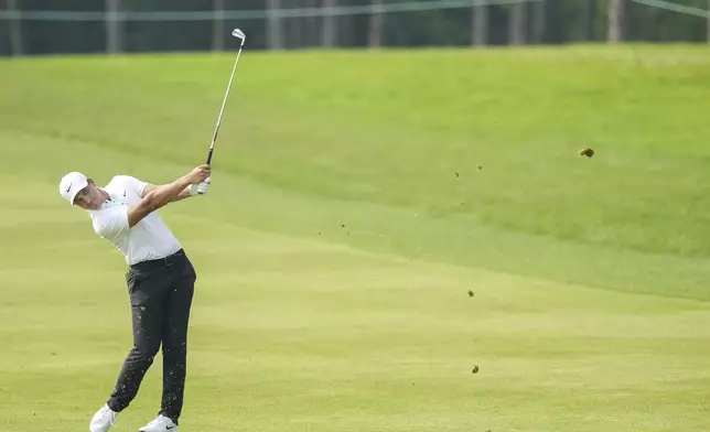 Cameron Champ hits his approach shot from the 18th fairway during the first round of the Canadian Open golf tournament in Caledon, Ontario, Thursday, June 5, 2025. (Nathan Denette/The Canadian Press via AP)