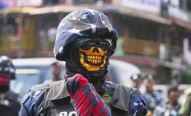 A police officer guards during anti-government protests on streets of Lagos, Nigeria, Thursday, June 12, 2025. (AP Photo/Sunday Alamba)