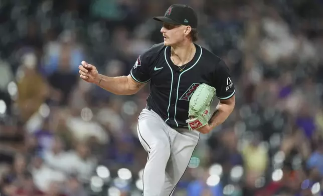 Arizona Diamondbacks relief pitcher Shelby Miller reacts after striking out Colorado Rockies' Sam Hilliard to end a baseball game Saturday, June 21, 2025, in Denver. (AP Photo/David Zalubowski)