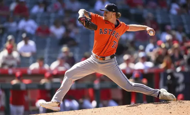 Houston Astros pitcher Josh Hader delivers a pitch during the ninth inning of a baseball game against the Los Angeles Angels, Sunday, June 22, 2025, in Anaheim, Calif. (AP Photo/William Liang)
