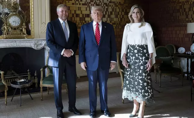 President Donald Trump poses with Netherlands' King Willem Alexander, left, and Netherlands' Queen Maxima at the Paleis Huis den Bosch prior to attending a NATO summit, in The Hague, Netherlands, Wednesday, June 25, 2025. (Brendan Smialowski/Pool Photo via AP)