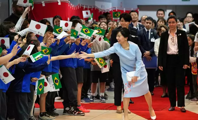Japan's Princess Kako of Akishino is welcomed to the Bunkyo Brazilian Society of Japanese Culture in Sao Paulo, Friday, June 6, 2025. (AP Photo/Andre Penner)