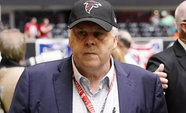 FILE - Frederick W. Smith, Chairman, President and CEO of FedEx Corporation is seen before the first half of an NFL football game between the Atlanta Falcons and the Philadelphia Eagles, Sunday, Sept. 12, 2021, in Atlanta. (AP Photo/John Bazemore, File)
