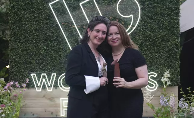Winner of the Women's Prize for Fiction Rachel Clarke for her book 'The Story of a Heart', right, and Winner of the Women's Prize for Non Fiction Yael van Der Wouden, who wrote 'The Safekeep' pose for the media in London, Thursday, June 12, 2025. (AP Photo/Joanna Chan)
