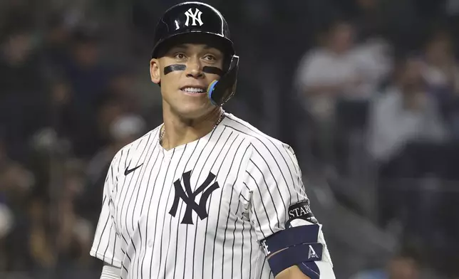 New York Yankees' Aaron Judge walks to the dugout after striking out during the sixth inning of a baseball game against the Los Angeles Angels, Tuesday, June 17, 2025, in New York. (AP Photo/Pamela Smith)