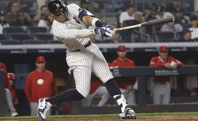 New York Yankees' Aaron Judge is struck out by Los Angeles Angels pitcher Kyle Hendricks during the sixth inning of a baseball game Tuesday, June 17, 2025, in New York. (AP Photo/Pamela Smith)