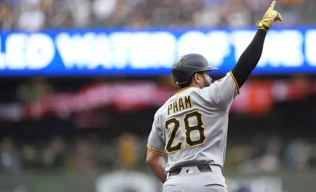 Pittsburgh Pirates' Tommy Pham gestures as he rounds the bases after hitting a two-run home run during the fourth inning of a baseball game against the Milwaukee Brewers, Monday, June 23, 2025, in Milwaukee. (AP Photo/Aaron Gash)