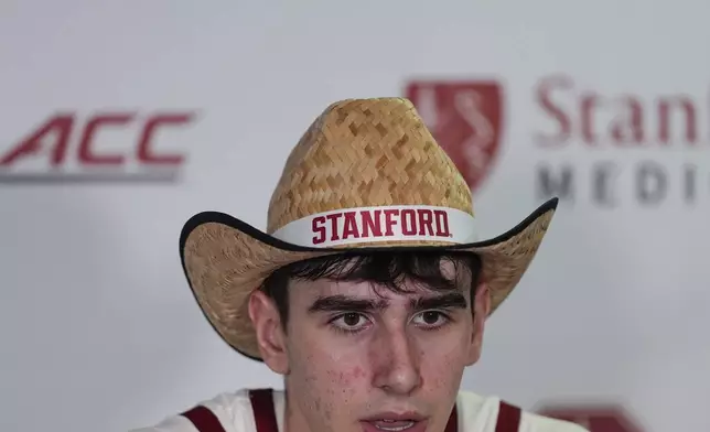 FILE - Stanford forward Maxime Raynaud talks to reporters during a press conference, following the team's victory over California in an NCAA college basketball game, on Feb. 22, 2025, in Stanford, Calif. (AP Photo/Godofredo A. Vásquez, File)