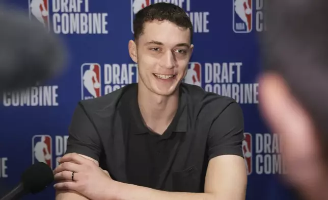 FILE - Ryan Kalkbrenner talks to media at the 2025 NBA basketball Draft Combine in Chicago, on May 14, 2025. (AP Photo/Nam Y. Huh, File)