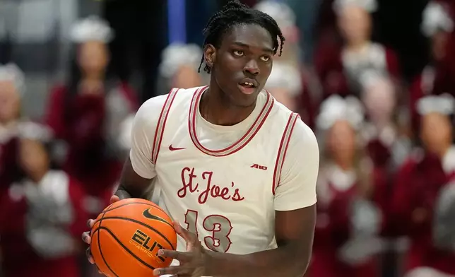 FILE - Saint Joseph's Rasheer Fleming plays during an NCAA college basketball game, Tuesday, Feb. 6, 2024, in Philadelphia. (AP Photo/Matt Slocum, File)
