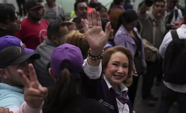 Yasmin Esquivel, who is running for election for the Mexican Supreme Court, greets supporters at her closing campaign rally in Mexico City, Wednesday, May 28, 2025. (AP Photo/Marco Ugarte)
