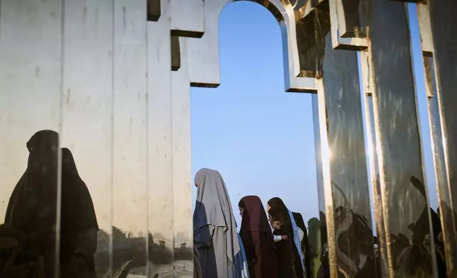 Muslim worshippers gather for Eid al-Adha prayer in the mixed Arab Jewish city of Jaffa, near Tel Aviv, Israel, Friday, June 6, 2025. (AP Photo/Oded Balilty)