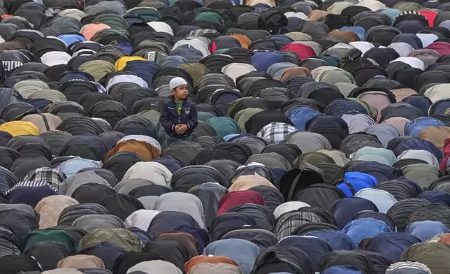 Muslims offer Eid al-Adha prayer at the Moskovsky central avenue during celebrations in St. Petersburg, Russia, Friday, June 6, 2025. (AP Photo/Dmitri Lovetsky)