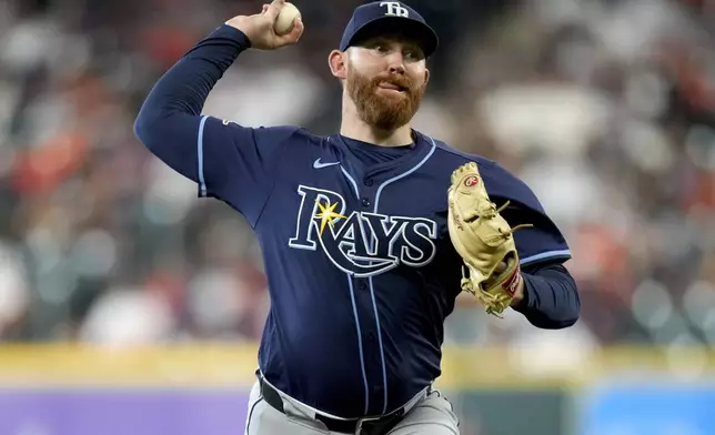 Tampa Bay Rays starting pitcher Zack Littell throws against the Houston Astros during the first inning of a baseball game Saturday, May 31, 2025, in Houston. (AP Photo/Eric Christian Smith)