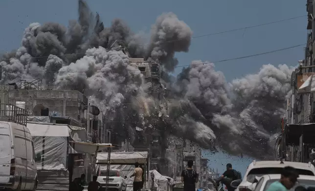 Smoke rises to the sky following an Israeli strike in Gaza City, Sunday, June 1, 2025. (AP Photo/Jehad Alshrafi)