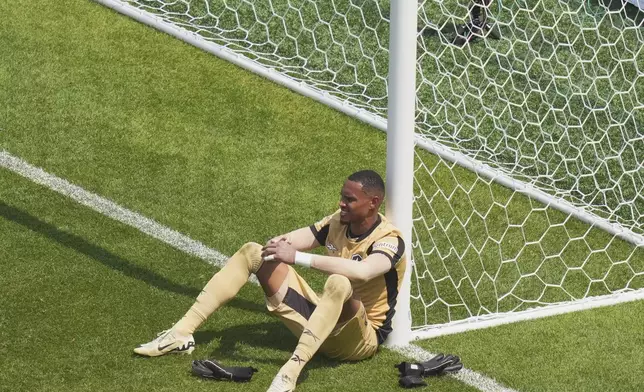 Botafogo goalkeeper John reacts after his team's loss to Palmeiras during the Club World Cup round of 16 soccer match between Palmeiras and Botafogo in Philadelphia, Saturday, June 28, 2025. (AP Photo/Chris Szagola)