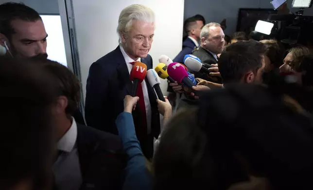 Far-right lawmaker Geert Wilders talks to the media after pulling his party out of the four-party Dutch coalition in The Hague, Netherlands, Tuesday, June 3, 2025. (AP Photo/Peter Dejong)