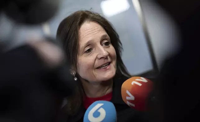 Nicolien van Vroonhoven, leader of the New Social Contract party, reacts after a meeting in The Hague, Netherlands, Tuesday, June 3, 2025, after far-right lawmaker Geert Wilders pulled his party out of the ruling four-party Dutch coalition in dispute over migration. (AP Photo/Peter Dejong)