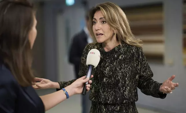 Dilan Yesilgöz, leader of the right-wing People's Party for Freedom and Democracy, speaks to the media after a meeting in The Hague, Netherlands, Tuesday, June 3, 2025, after far-right leader Geert Wilders pulled his party out of the ruling four-party Dutch coalition in dispute over migration. (AP Photo/Peter Dejong)