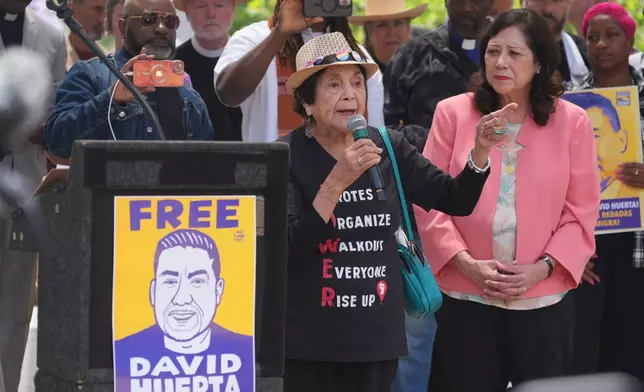 Civil rights legend Dolores Huerta, 95, speaks at a rally in Los Angeles, Monday, June 9, 2025, calling for the release of labor union leader David Huerta, who was arrested during a protest on June 6. (AP Photo/Damian Dovarganes)
