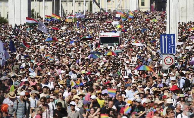 Participants in the Pride march cross the Elisabeth Bridge in Budapest, Hungary, Saturday, June 28, 2025. (AP Photo/Rudolf Karancsi)