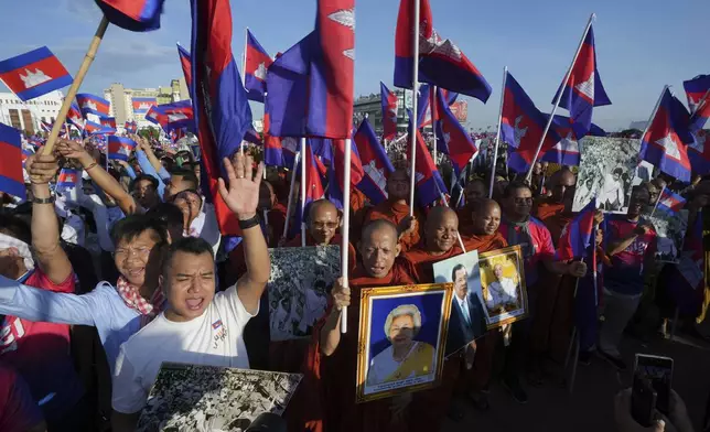People participate in a government-organized unity parade in support of Cambodian frontline forces guarding the territory and sovereignty of the country in Phnom Penh Cambodia, Wednesday, June 18, 2025. (AP Photo/Heng Sinith)