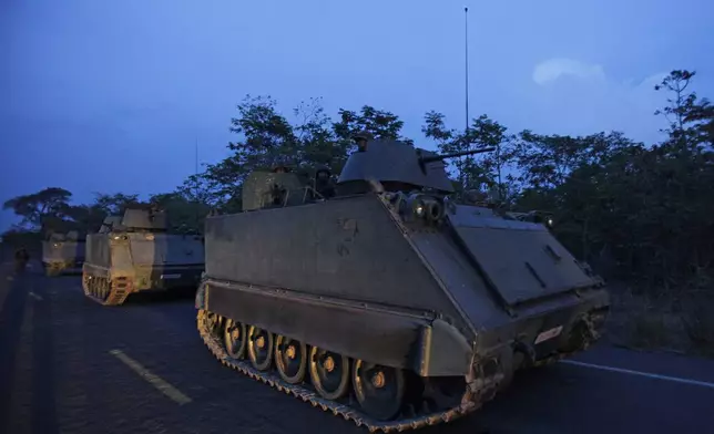 FILE- Thai soldiers on armored personnel carriers take a position at the border during fighting between Thailand and Cambodia in Surin province, northeastern Thailand Tuesday, April 26, 2011. (AP Photo/Sakchai Lalit, File)