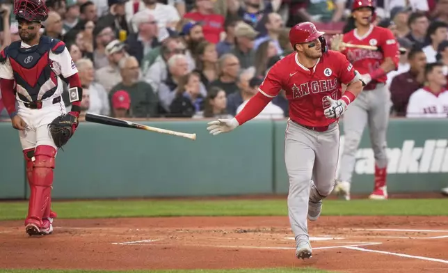 Los Angeles Angels designated hitter Mike Trout (27) watches his home run during the first inning of a baseball game against the Boston Red Sox, Monday, June 2, 2025, in Boston. (AP Photo/Robert F. Bukaty)