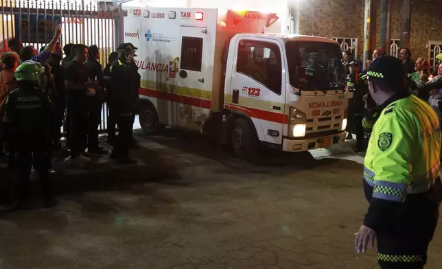 An ambulance leaves the Medicentro hospital carrying Colombian senator and presidential candidate Miguel Uribe Turbay to another hospital for treatment after he was shot during a campaign rally in Bogota, Colombia, Saturday, June 7, 2025. (AP Photo/Jhon Wilson Vizcaino)