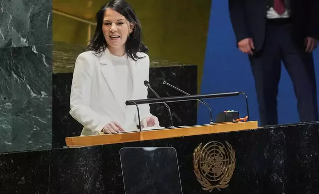 Annalena Baerbock of Germany addresses the United Nations General Assembly after she was elected as president of the 80th session of the body, Monday, June 2, 2025. (AP Photo/Richard Drew)