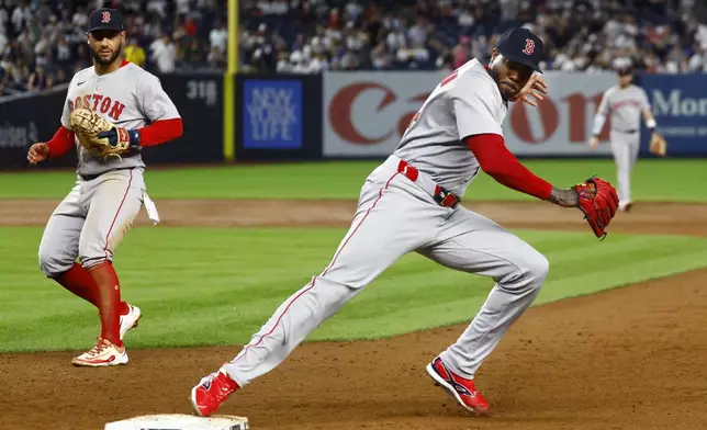 Boston Red Sox pitcher Aroldis Chapman (44) touches first base for the final out against the New York Yankees during the ninth inning of a baseball game, Saturday, June 7, 2025, in New York. (AP Photo/Noah K. Murray)