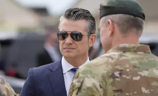 Defense Secretary Pete Hegseth arrives with President Donald Trump at Fort Bragg, Tuesday, June 10, 2025, in Fort Bragg, N.C. (AP Photo/Alex Brandon)