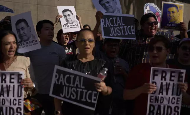 People chant during a rally of union workers and others for David Huerta, the president of Service Employees International Union California, Monday, June 9, 2025, in Las Vegas. (AP Photo/John Locher)