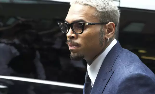 R&amp;B singer Chris Brown arrives at Southwark Crown Court to attend a plea hearing in London, Friday, June 20, 2025.(AP Photo/Frank Augstein)