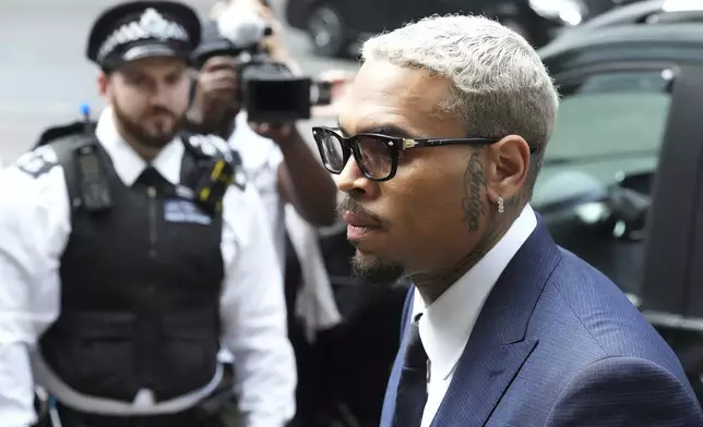 R&amp;B singer Chris Brown arrives at Southwark Crown Court to attend a plea hearing in London, Friday, June 20, 2025.(AP Photo/Frank Augstein)