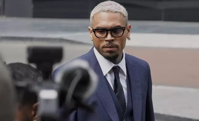 R&amp;B singer Chris Brown arrives at Southwark Crown Court to attend a plea hearing in London, Friday, June 20, 2025. (AP Photo/Frank Augstein)