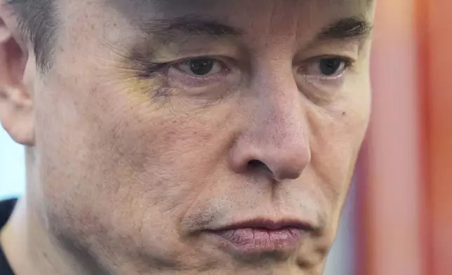 Elon Musk attends a news conference with President Donald Trump in the Oval Office of the White House, Friday, May 30, 2025, in Washington. (AP Photo/Evan Vucci)