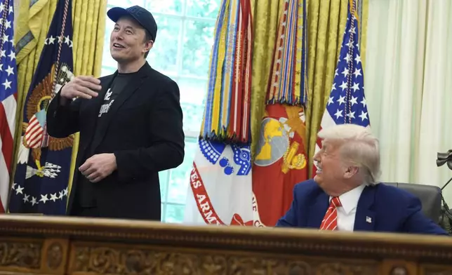 Elon Musk speaks during a news conference with President Donald Trump in the Oval Office of the White House, Friday, May 30, 2025, in Washington. (AP Photo/Evan Vucci)