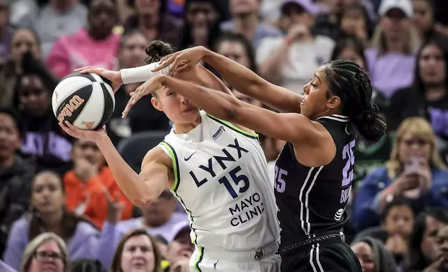 Golden State Valkyries' Monique Billings (25) defends against Minnesota Lynx's Jessica Shepard (15) in the first half of a WNBA basketball game in San Francisco, Sunday, June 1, 2025. (Carlos Avila Gonzalez/San Francisco Chronicle via AP)