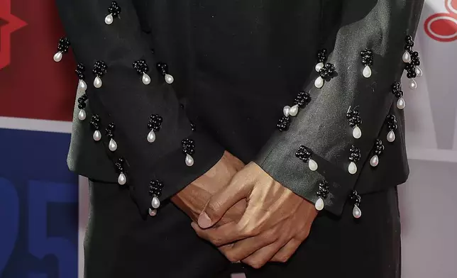Noa Essengue arrives for the first round of the NBA basketball draft, Wednesday, June 25, 2025, in New York. (AP Photo/Adam Hunger)