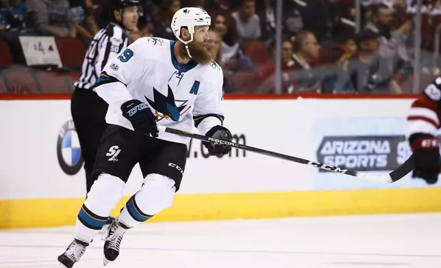 FILE - San Jose Sharks center Joe Thornton (19) skates to the puck during the first period of an NHL hockey game against the Arizona Coyotes on Nov. 22, 2017, in Glendale, Ariz. (AP Photo/Ross D. Franklin, File)