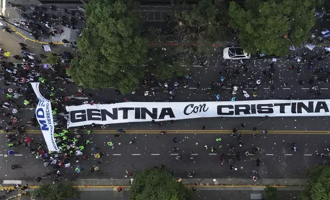 Supporters of Argentina's former President Cristina Fernandez leave at the end of a protest in her defense after she began serving a six-year prison sentence under house arrest for corruption, in Buenos Aires, Argentina, Wednesday, June 18, 2025. (AP Photo/Rodrigo Abd)