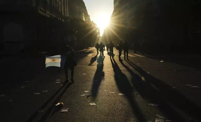 Supporters of Argentina's former President Cristina Fernandez leave at the end of a protest in her defense after she began serving a six-year prison sentence under house arrest for corruption, in Buenos Aires, Argentina, Wednesday, June 18, 2025. (AP Photo/Rodrigo Abd)