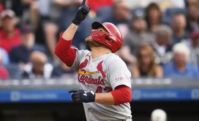 St. Louis Cardinals' Pedro Pagés gestures as he runs to home plate with a home run in the third inning of a baseball game against the Cleveland Guardians in Cleveland, Friday, June 27, 2025. (AP Photo/Sue Ogrocki)